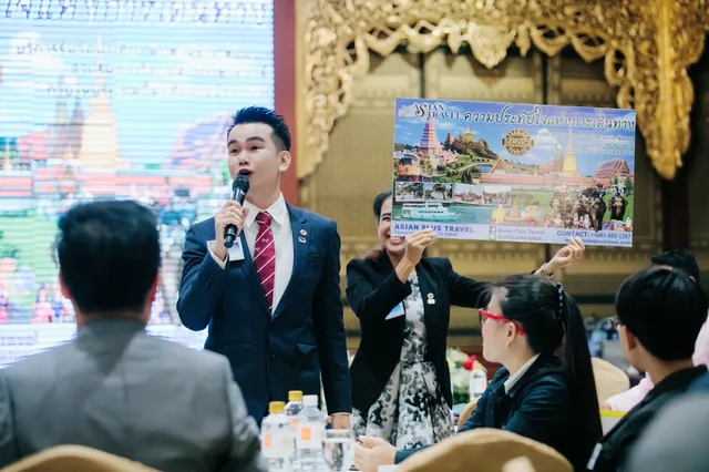 Phudit presenting Asian Plus Travel Thailand to an audience