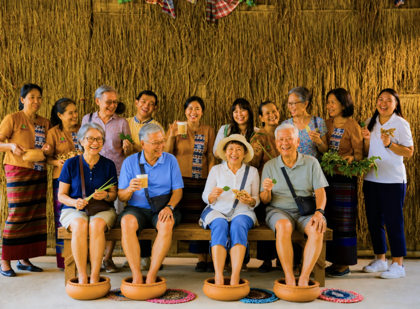 Guests enjoying foot baths and herbal wellness activities with local hosts